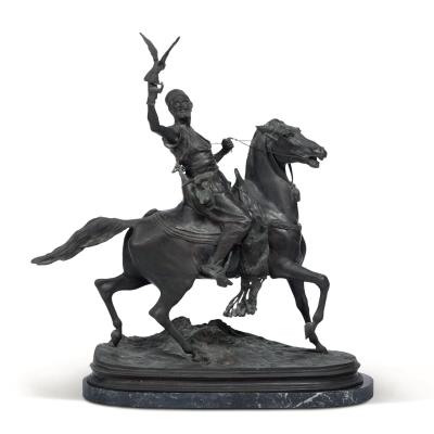 Arab falconer on horseback
