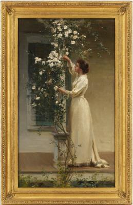 Young Woman Standing Before a Trellis of Flowers
