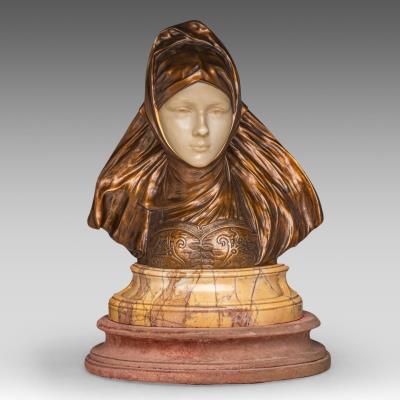 Art Nouveau bust of a lady wearing a headscarf