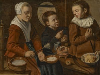 Three children in a kitchen interior
