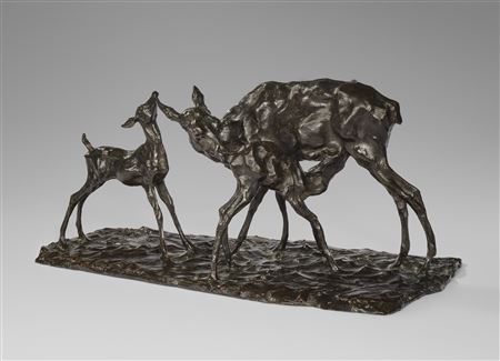 Doe and her two fawns, one suckling its mother
