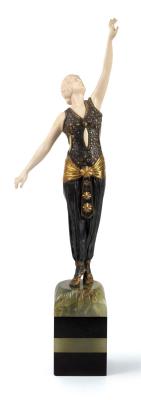 Dancer with raised left arm