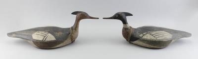 Pair of Folksy Red-Breasted Merganser Decoys by Reggie (Reg) Birch - Auction record, sale price, and art valuation. Compare with similar artists and explore comparable artworks.