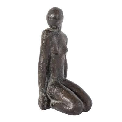 Kneeling woman