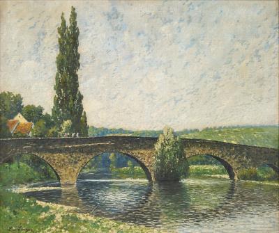 River landscape with view to an old arched bridge