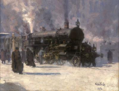 Before departure: Steaming locomotive on a wintry track