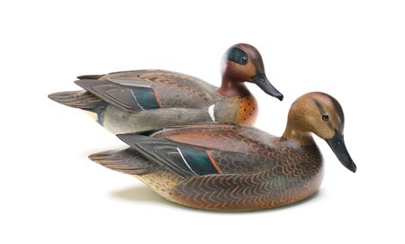 Pair of Greenwing Teal (decoys) by Lloyd Johnson - Auction record, sale price, and art valuation. Compare with similar artists and explore comparable artworks.