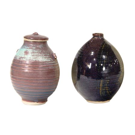 Two porcelain yellow glazed wheel thrown vases