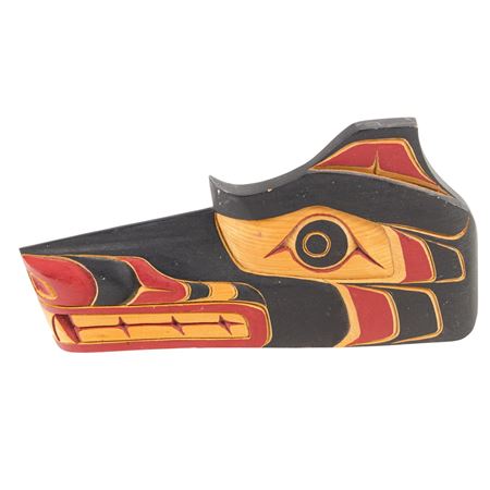 A Pacific Northwest plaque of a wolf