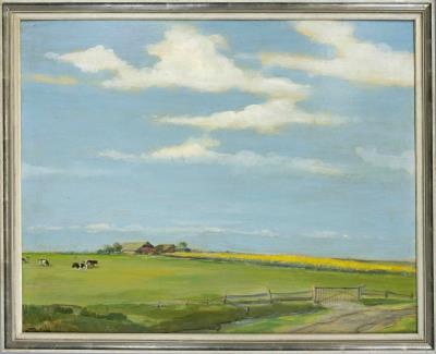 North German landscape with rapeseed and cows
