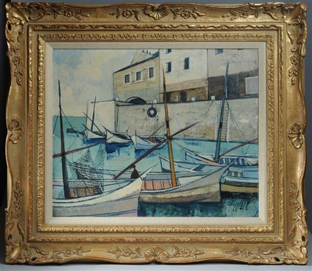 Mediterranean harbor scene with boats near a harbor wall and buildings beyond