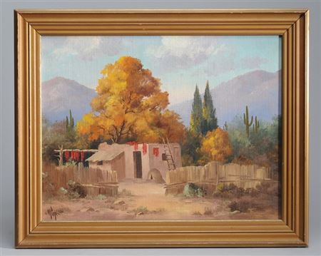 Adobe hut in landscape