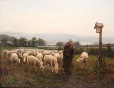Sheep herdswoman at sunset