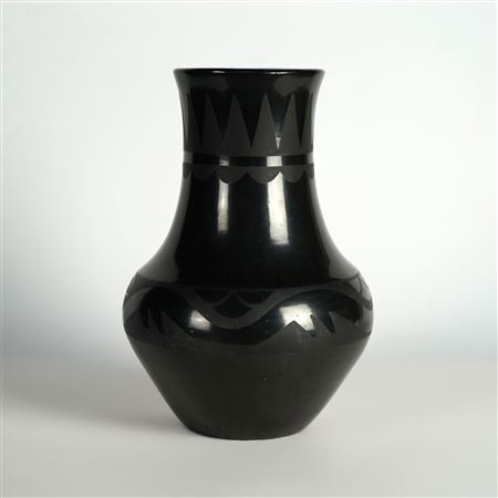 San Ildefonso Blackware Vase with Avanyu Design by Maria & Julian Martinez - Auction record, sale price, and art valuation. Compare with similar artists and explore comparable artworks.