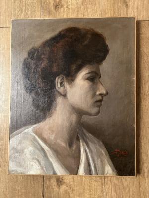 Portrait of a woman in a bun