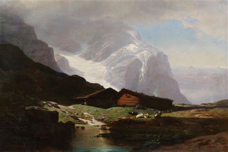 Goat herder by a mountain lake