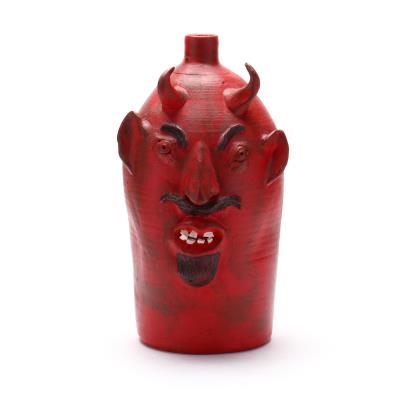 Large Devil Face Jug by Louis Brown - Auction record, sale price, and art valuation. Compare with similar artists and explore comparable artworks.