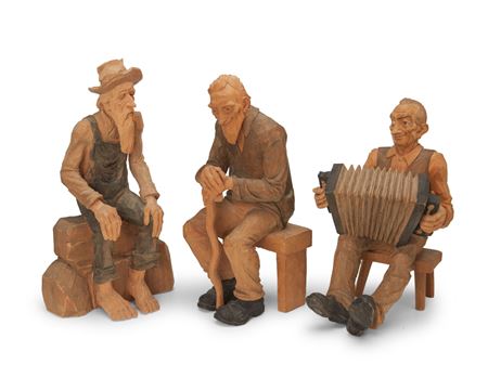 Three Seated Figures