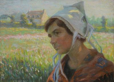 Breton woman in front of a field