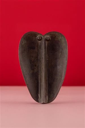Stylized baboon head