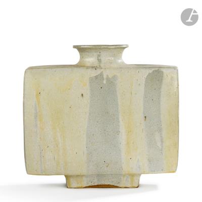 Very large heel-mounted vase with quadrangular body and oval flared neck