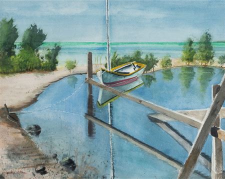 Sailboat in an inlet with ocean in the background
