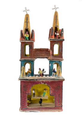 Folk art cathedral with figures