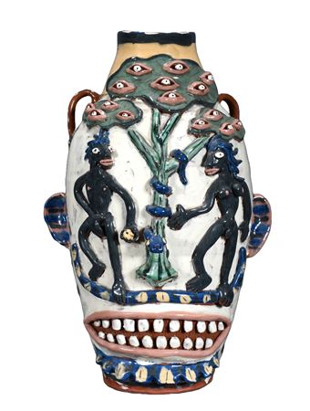 Monumental Adam & Eve Face Jug With Flowers on Verso.
