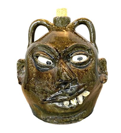 Double-Face Rock Tooth Politician Jug