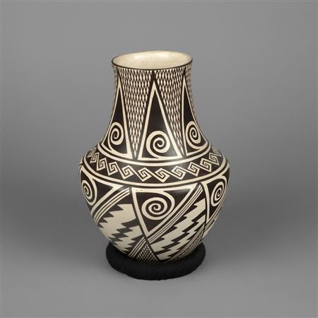 Black on White Pottery Jar by Helen Naha - Auction record, sale price, and art valuation. Compare with similar artists and explore comparable artworks.