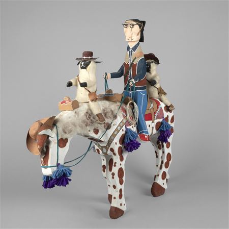 Rider on Horse with Two Sheep