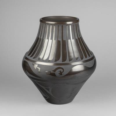 Large Blackware Jar with Feather and Avanyu Designs