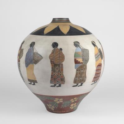 Pot with Figural Design