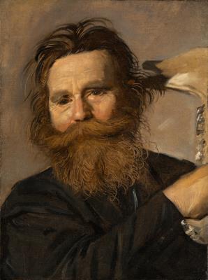 Portrait of Verdonck brandishing a jawbone