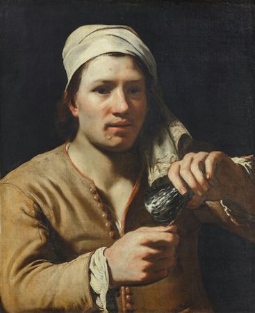 A young man wearing a turban holding an upturned roemer: the fingernail test