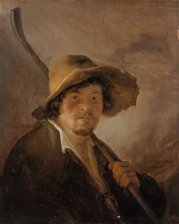 A shepherd in a wide-brimmed hat holding a crook