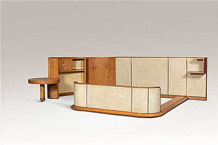 Bed and bookcase with swivel pedestal table