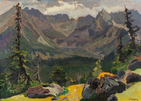 A lake in the mountains with Mnich in the background