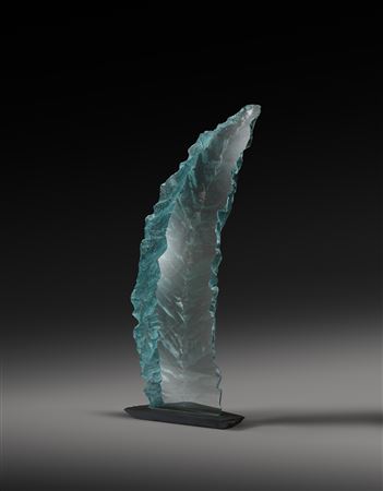 A large wave form glass sculpture