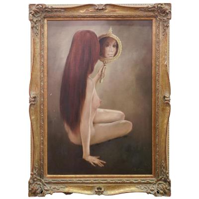 Portrait of a nude woman with hand mirror