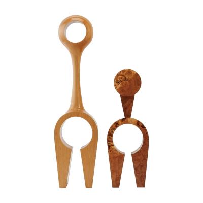 Two Carved Wood Sculptures ("Eye-Con" #4 and "Eye-Con")