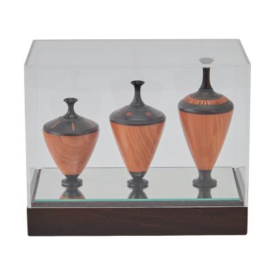 Set of Three Turned Vessels in Case