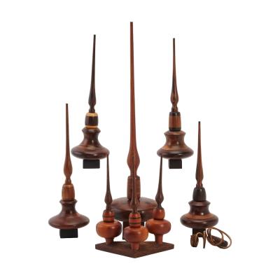 Eight Turned Wood Spinning Tops on Stands