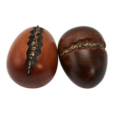 Double Oviform Sculpture with Bronze Decoration