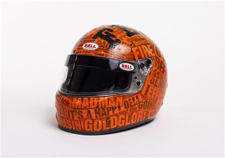 A Bell helmet with painted McLaren inspired design