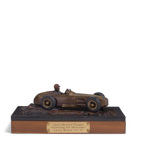 Juan Manuel Fangio "Wheeling the Mercedes"