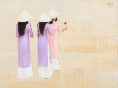 Women admiring a lotus flower