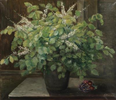 Still life with a jar of beech branches and flowers on a table