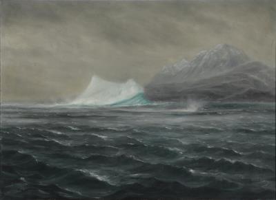 A view of a Greenlandic fjord with a mountain in the distance
