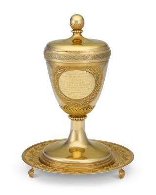 A Highly Important and Impressive Russian Three-Color Gold Cup, Cover and Stand Presented to Count Saltykov